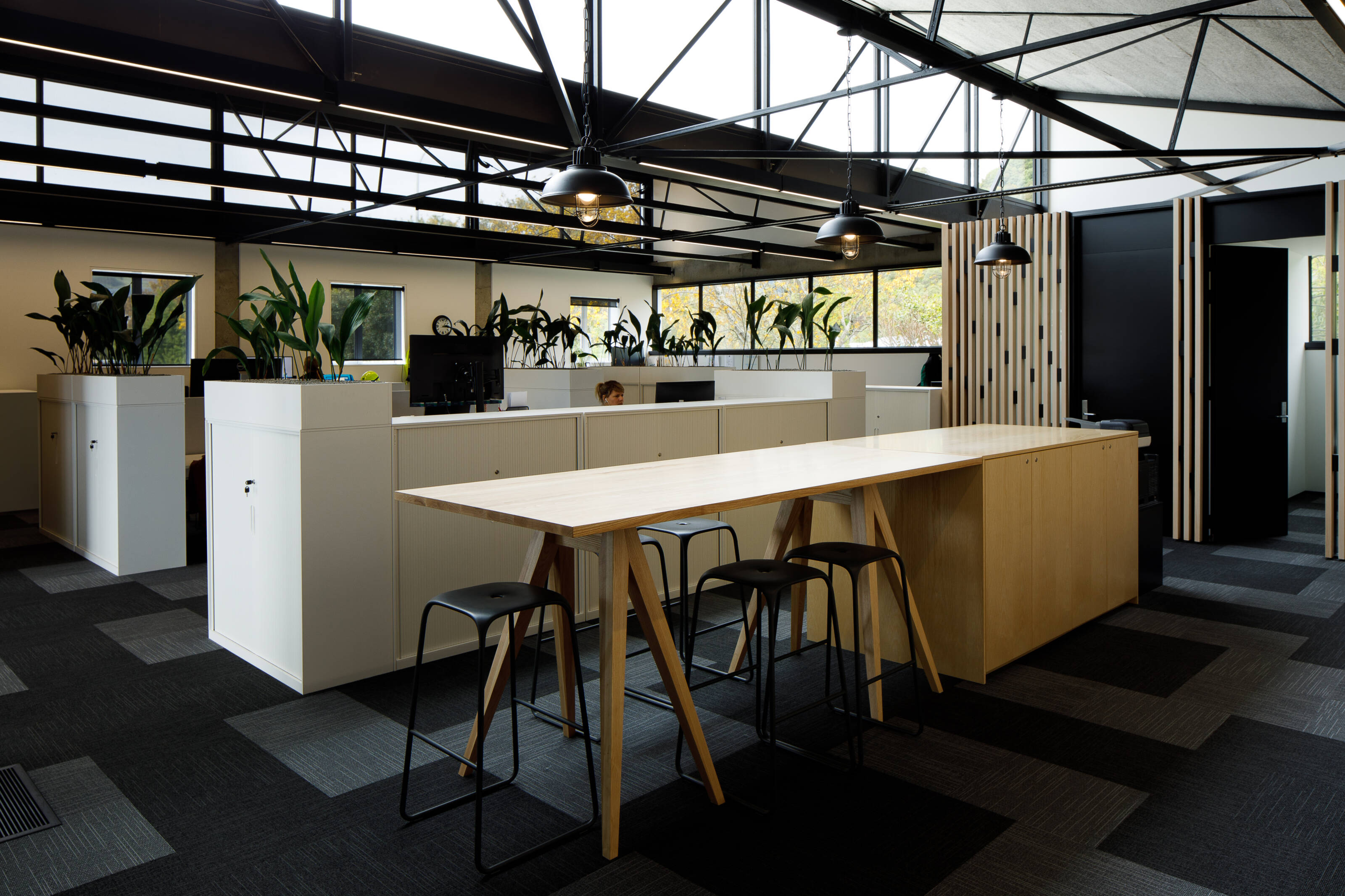 The adaptive reuse refurbishment of the Port Nelson offices transforms a 1950's warehouse into a modern, open plan workplace.